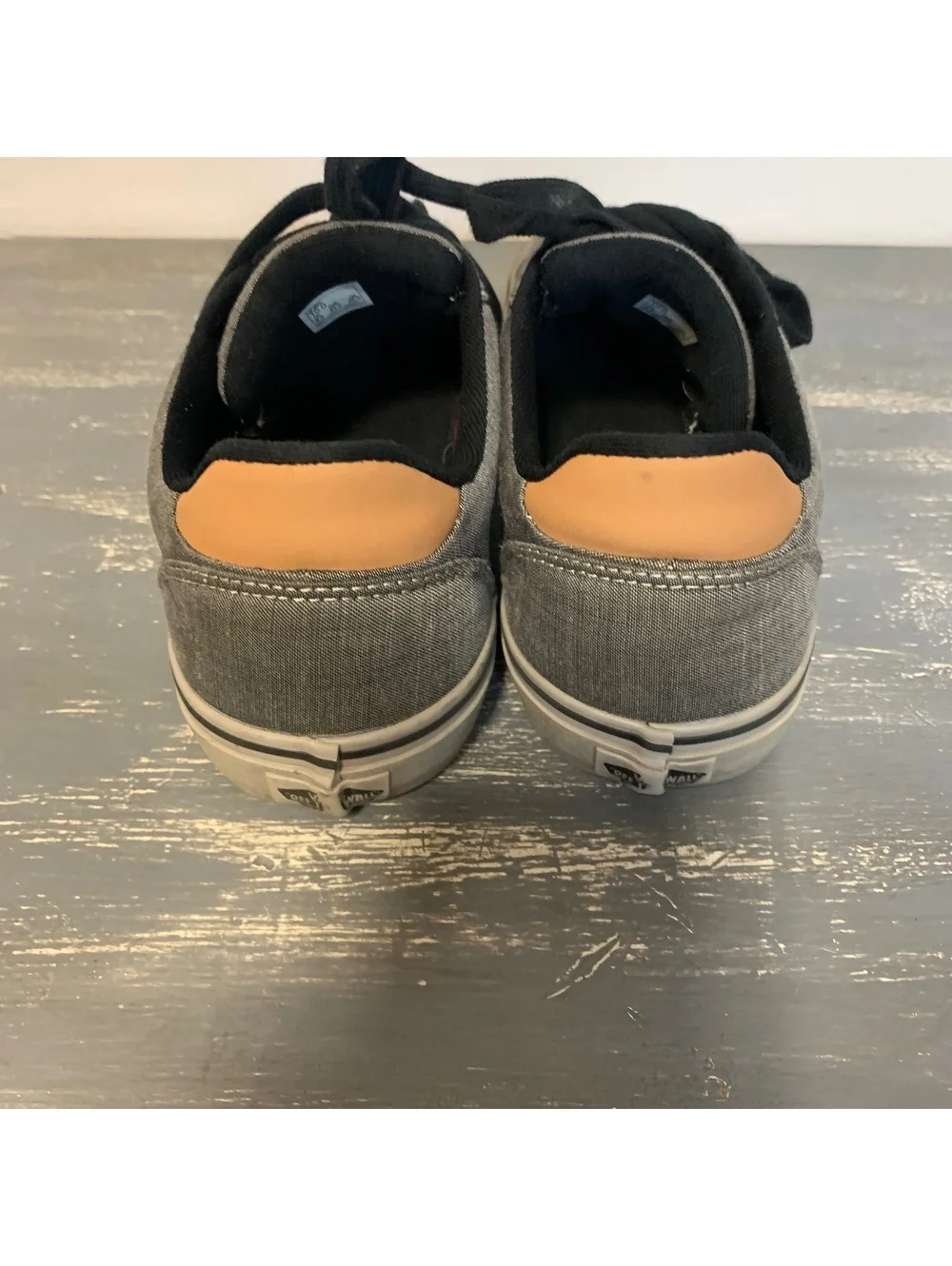 Gray low top lace-up sneakers